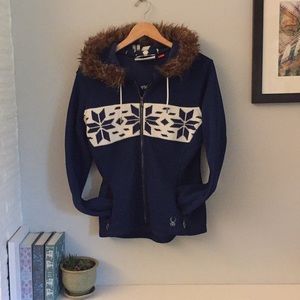 Spyder sweater with Nordic print and fur collar.